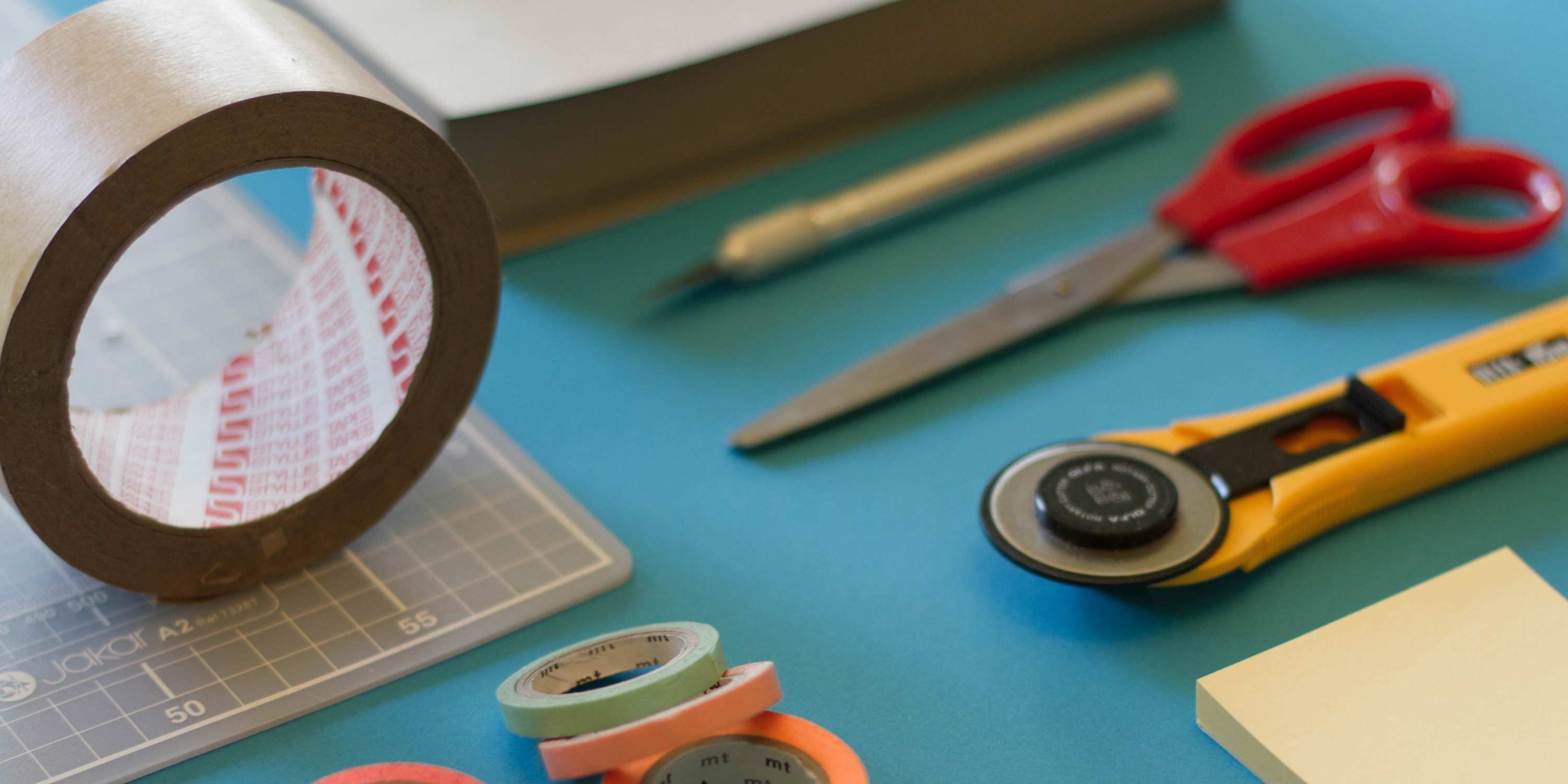 Paper cutting tools and tape