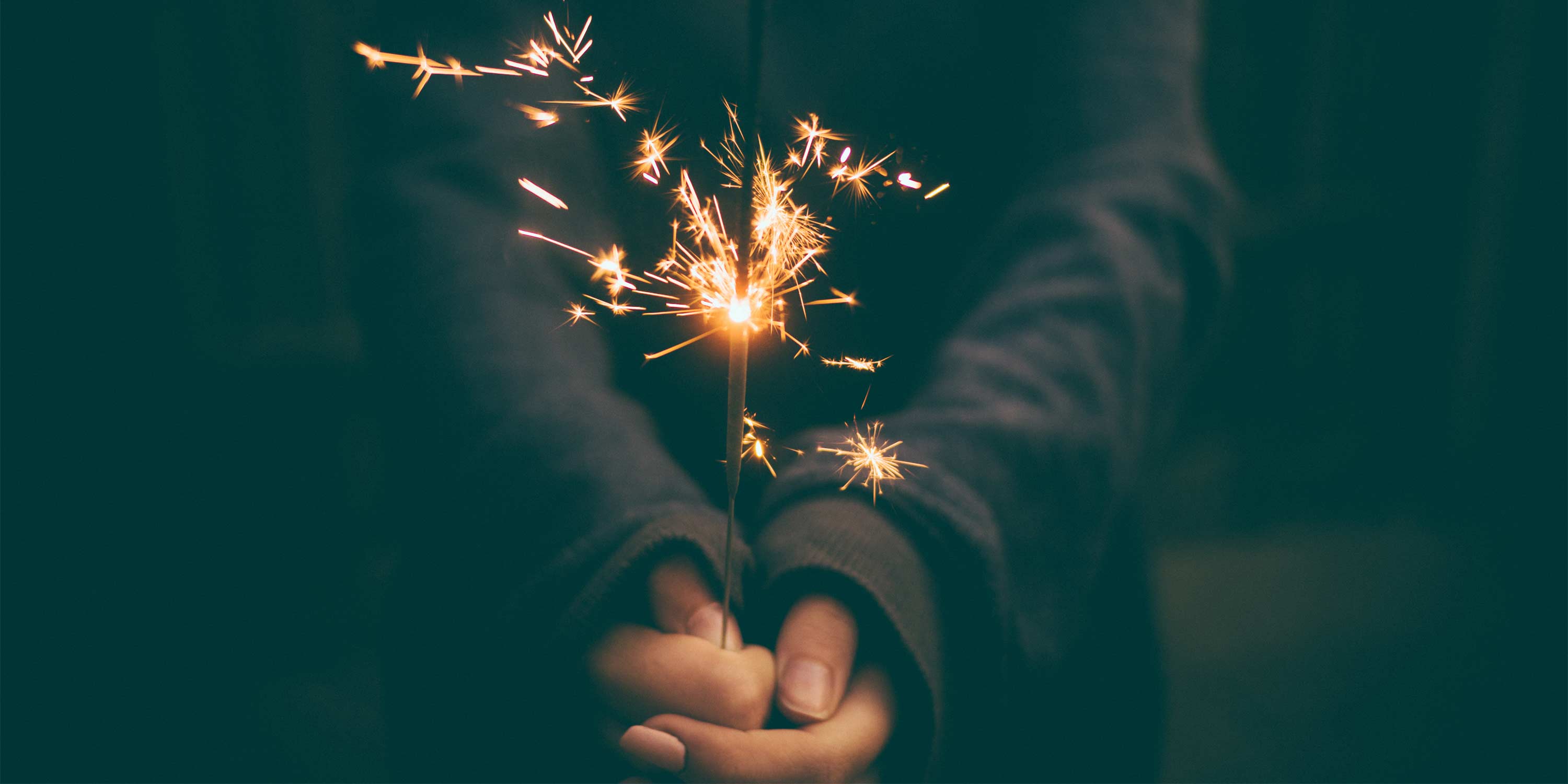 Picture of a person holding a sparkler
